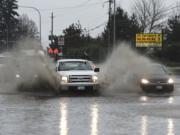 The seasonal roadway body of water known to some as “Goodwill Lake” is a common winter feature on Northeast 117th Avenue/state Highway 503 near Northeast 87th Street in Vancouver. For years, debris has clogged the road’s drainage system, causing motorists to literally make waves as they travel. But officials say a fix is coming.