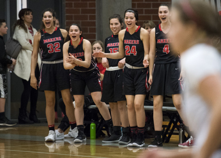 Camas cheers on their team during Friday night's game at Union High School on Jan. 26, 2018. The Papermakers won 53-33, clinching the 4A Greater St. Helens League title.