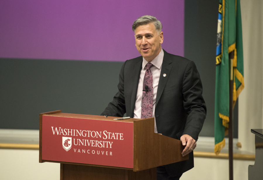 Washington State University Vancouver Chancellor Mel Netzhammer speaks at the State of the Campus address at the Salmon Creek university on Wednesday. Netzhammer addressed enrollment, construction and the campus budget in his speech.