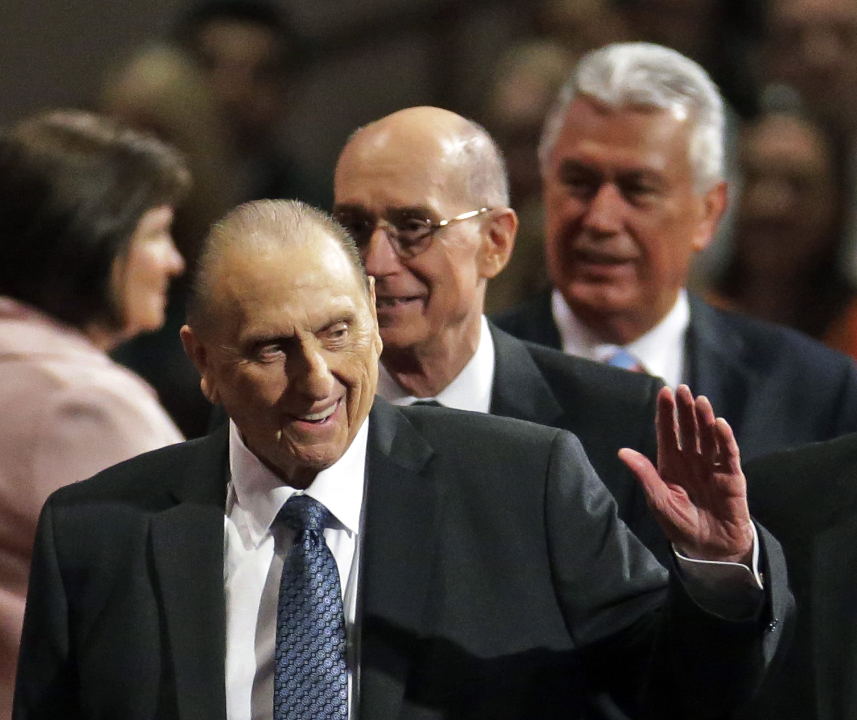President Thomas S. Monson, of The Church of Jesus Christ of Latter-day Saints, waves to the audience during the opening session of the Mormon church conference in Salt Lake City in 2015. Monson, the 16th president of the Mormon church, died after nine years in office. He was 90.