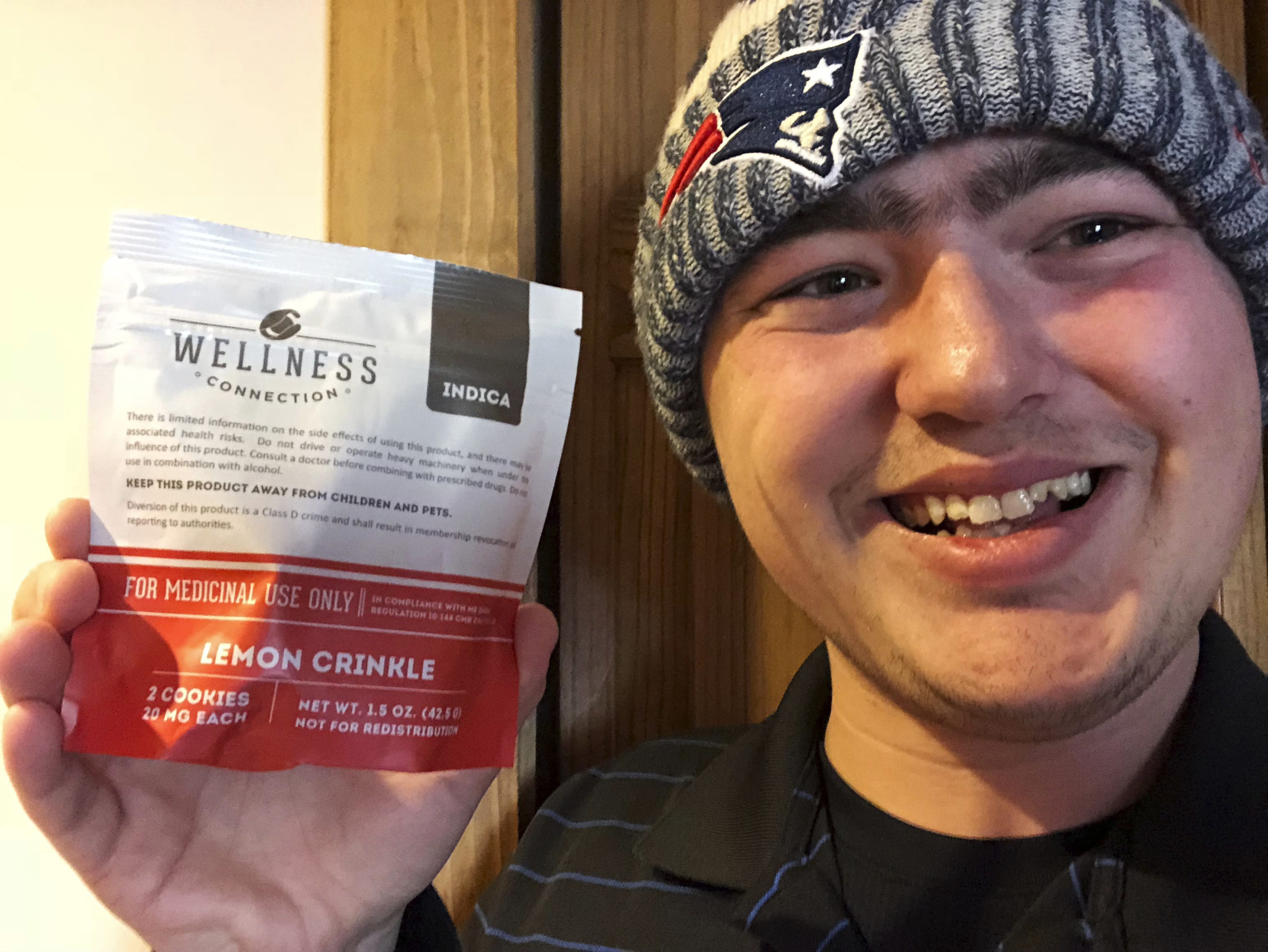 This Jan. 10, 2018, photo provided by Zac Mercauto shows him holding a package of marijuana cookies in Fryeburg, Maine. Mercauto is one of many proponents of legalized marijuana who supports President Donald Trump, but thinks his administration is wrong about its anti-pot stance.