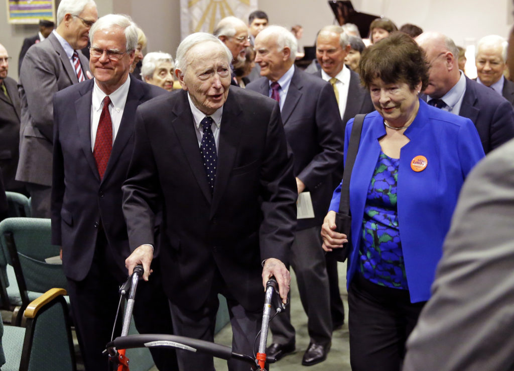 FILE - This Tuesday, May 30, 2017 file photo, former Washington Gov. John Spellman, second from left, leaves a memorial service in Renton, Wash. Spellman, the last Republican governor elected in Washington, has died at age 91. Spellman’s son, Seattle attorney David Spellman, confirmed his death Tuesday, Jan. 16, 2018. (AP Photo/Ted S.