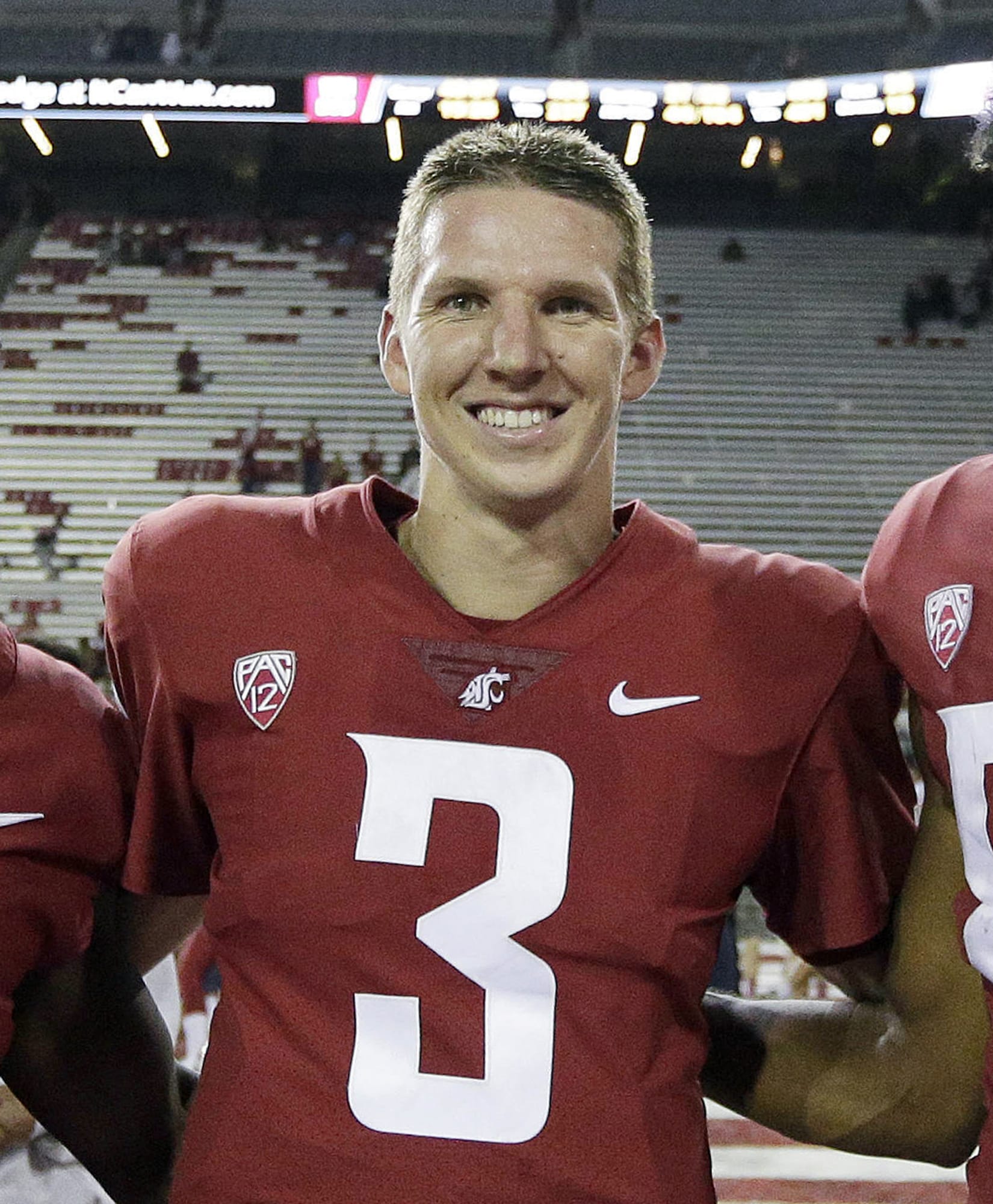 FILE - In this Sept. 9, 2017, file photo, Washington State quarterback Tyler Hilinski poses for a photo after an NCAA college football game against Boise State in Pullman, Wash. Hilinski has died from an apparent self-inflicted gunshot wound. The 21-year-old Hilinski was discovered in his apartment after he didn't show up for practice Tuesday, Jan. 16, 2018.