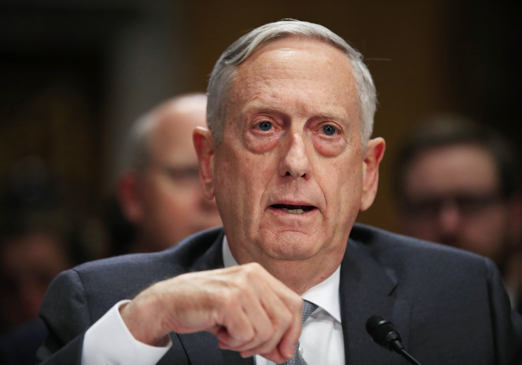 FILE - In this Oct. 30, 2017, file photo, Secretary of Defense Jim Mattis, testifies during a Senate Foreign Relations Committee hearing on "The Authorizations for the Use of Military Force: Administration Perspective" on Capitol Hill in Washington. A half century after the Tet Offensive punctured American hopes for victory in Vietnam, Mattis is visiting the former enemy to promote closer ties. Mattis will be in Vietnam just days before the 50th anniversary of the Communist offensive on Jan. 30-31, 1968, in which North Vietnam attacked an array of key objectives in the South, including the city of Hue.