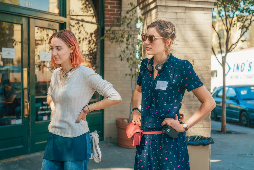 This image released by A24 Films shows director Greta Gerwig, right, and Saoirse Ronan on the set of "Lady Bird." Gerwig is expected to be the fifth woman nominated for an Oscar for best director when the nominations for the 90th annual Academy Awards are announced on Tuesday.