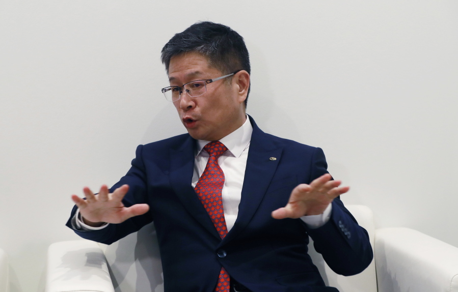 Wang Qiujing, president of Guangzhou Automobile Group, is interviewed at the North American International Auto Show, Monday, Jan. 15, 2018, in Detroit. Chinese automaker GAC Motor says it’s on track to enter the U.S. market in the fourth quarter of 2019.