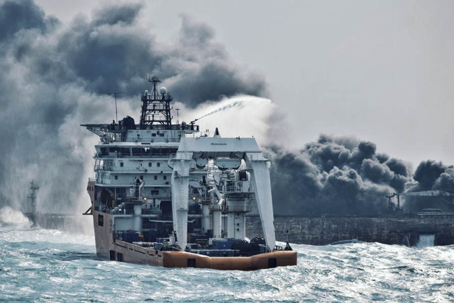 In this Jan. 10, 2018 photo provided by China’s Ministry of Transport, a firefighting boat works to put on a blaze on the oil tanker Sanchi in the East China Sea off the eastern coast of China. Rescue ships looking for missing crew members from the oil tanker Sanchi have expanded their search area to more than 2,600 square kilometers (1,000 square miles) as Chinese state television reported Friday that maritime authorities still have not found any survivors, or put out the blaze onboard the ship.