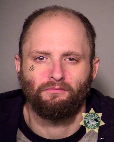 Daniel L. Cronin, 35, was arrested Tuesday night in the St. Johns neighborhood of Portland following an hours-long standoff involving Portland police and Clark County law enforcement. Cronin is one of two men facing allegations that they burgled and then set fire to a home in Hockinson on Christmas Eve.