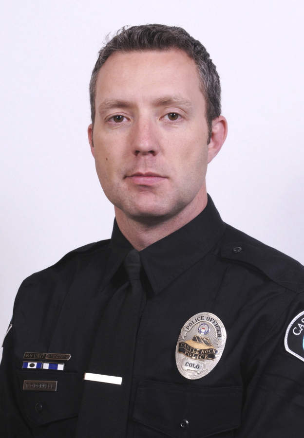 This undated photo provided by the Douglas County Sheriff’s Office shows Castle Rock Police Department Officer Tom O’Donnell. Several sheriff’s deputies and O’Donnell were injured when a man fired dozens of rounds at the deputies on Sunday, Dec. 31, 2017, before being fatally shot himself in what authorities called an ambush.