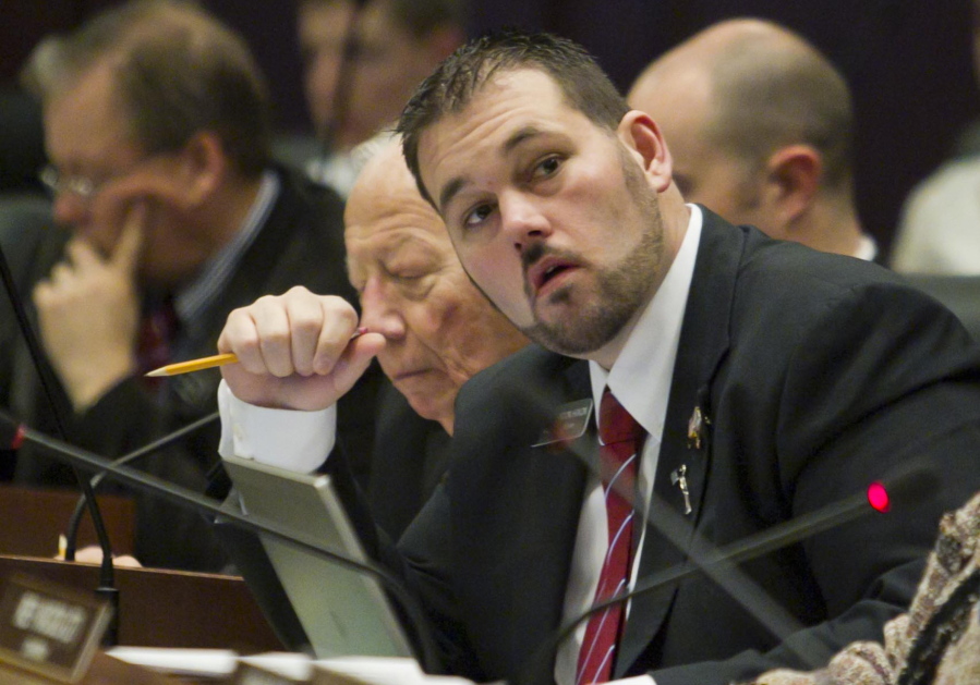 FILE- In this March 7, 2013, file photo, state Rep. Brandon A. Hixon, R-Caldwell, looks on at the statehouse in Boise, Idaho. The former Idaho Republican state lawmaker, who was under investigation for possible sexual abuse, died in an apparent suicide, according to authorities on Tuesday, Jan. 9, 2018.