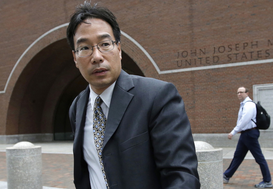 Glenn Chin, supervisory pharmacist at the now-closed New England Compounding Center, leaves federal court in Boston. Chin, a Massachusetts pharmacist charged in a deadly 2012 meningitis outbreak, was cleared in October of second-degree murder charges, but convicted on dozens of other counts. He is scheduled to be sentenced on Wednesday, Jan. 31, 2018.