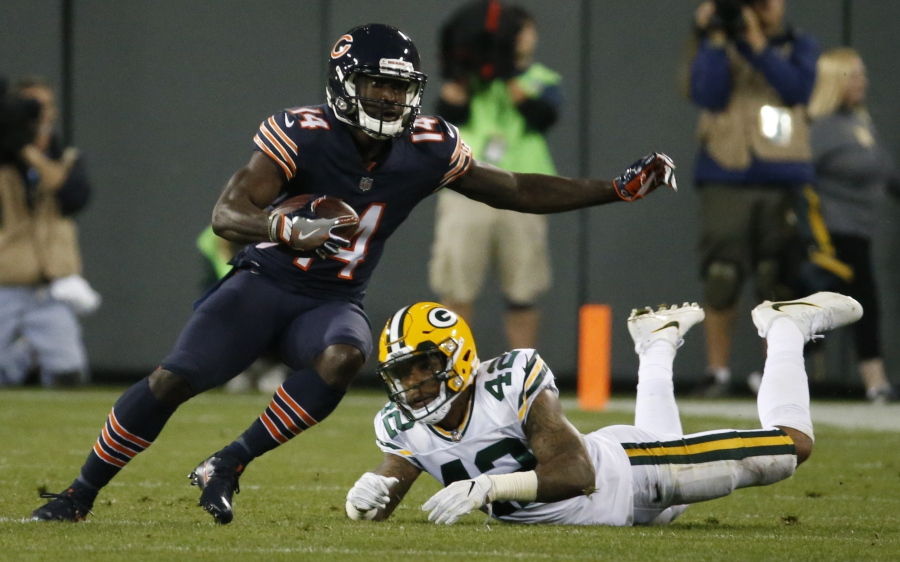 The Chicago Bears’ Deonte Thompson gets past the Green Bay Packers’ Morgan Burnett during the first half of an NFL football game in Green Bay, Wis., in September.