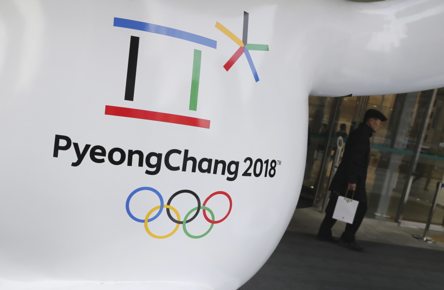 The official emblem of the 2018 Pyeongchang Olympic Winter Games is seen in downtown Seoul, South Korea. With little time to spare, North and South Korea are preparing to discuss Kim Jong Un’s offer to send a delegation to next month’s Winter Olympics.