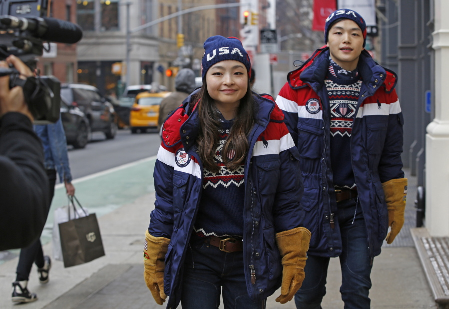 Ice dancing pair and sister and brother Maia and Alex Shibutani, who will participate in the upcoming Winter Olympics in Pyeongchang, South Korea, model Team USA’s opening ceremony uniforms Monday outside Polo Ralph Lauren’s Prince Street store in New York.