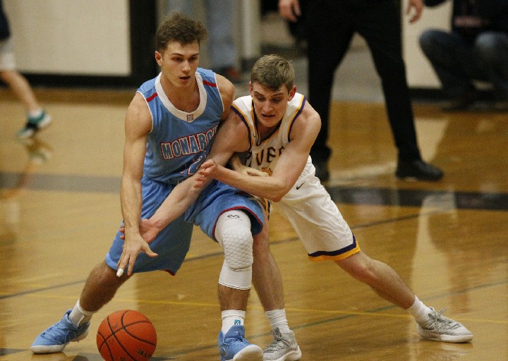 Jacob Hjort, right, of Columbia River defends against Gage Hendrickson of Mark Morris.