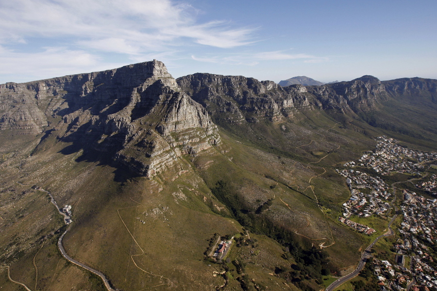 A 2009 aerial view of Table Mountain, left, which forms the backdrop for Cape Town in South Africa.