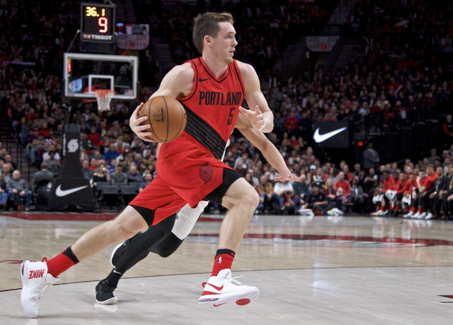 Portland Trail Blazers guard Pat Connaughton drives to the basket against the San Antonio Spurs during the first half of an NBA basketball game in Portland, Ore., Sunday, Jan. 7, 2018.