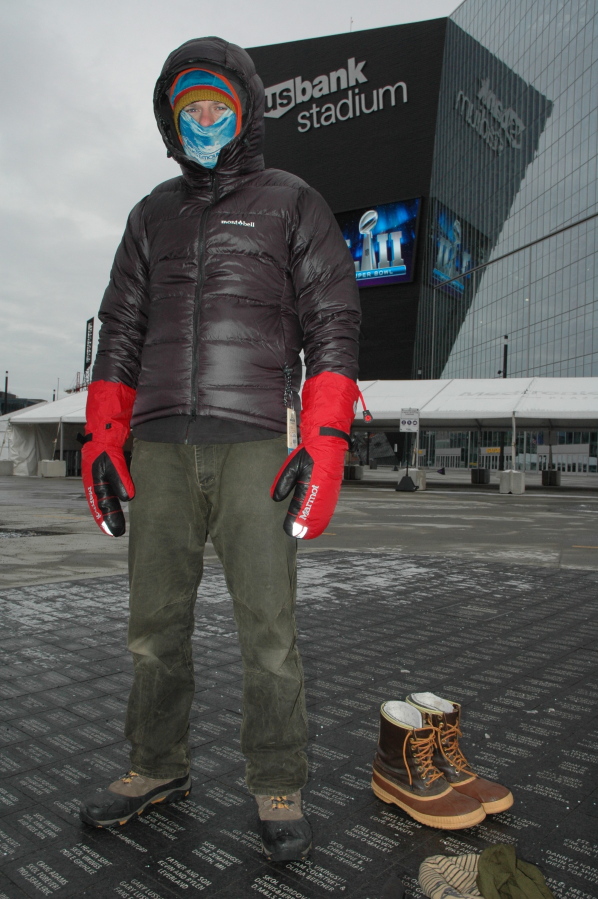 Steve Schreader, who works at Midwest Mountaineering, in Minneapolis, models winter apparel outside US Bank Stadium in Minneapolis.
