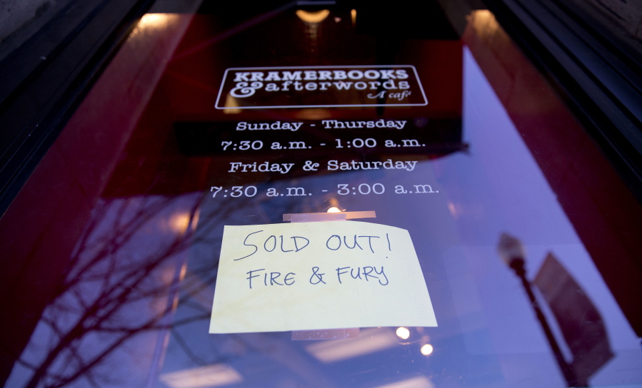 Sign posted at the door for Kramerbooks & Afterwords Cafe indicating that the book “Fire and Fury: Inside the Trump White House” is sold out at the bookstore located in the Dupont Circle neighborhood in Washington on Friday.