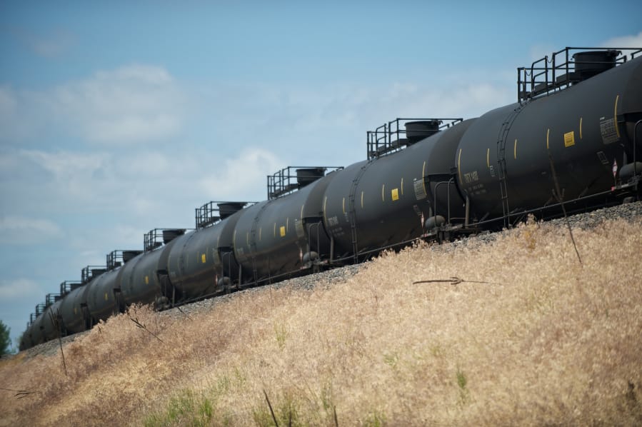 An oil train waits to move westbound in Vancouver.
