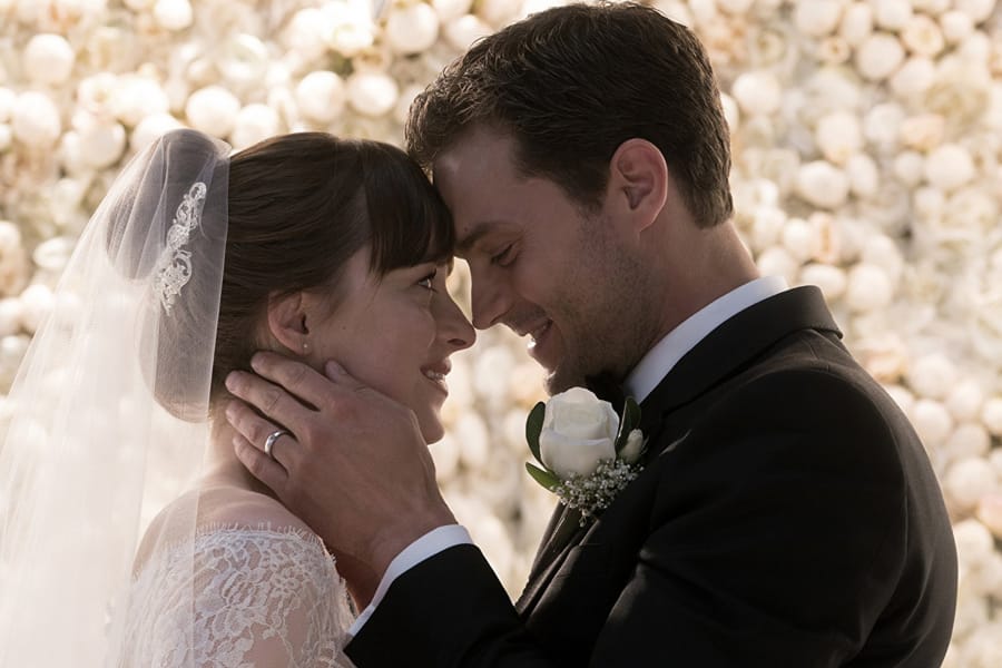 Dakota Johnson and Jaime Dornan in “Fifty Shades Freed.” Universal Pictures
