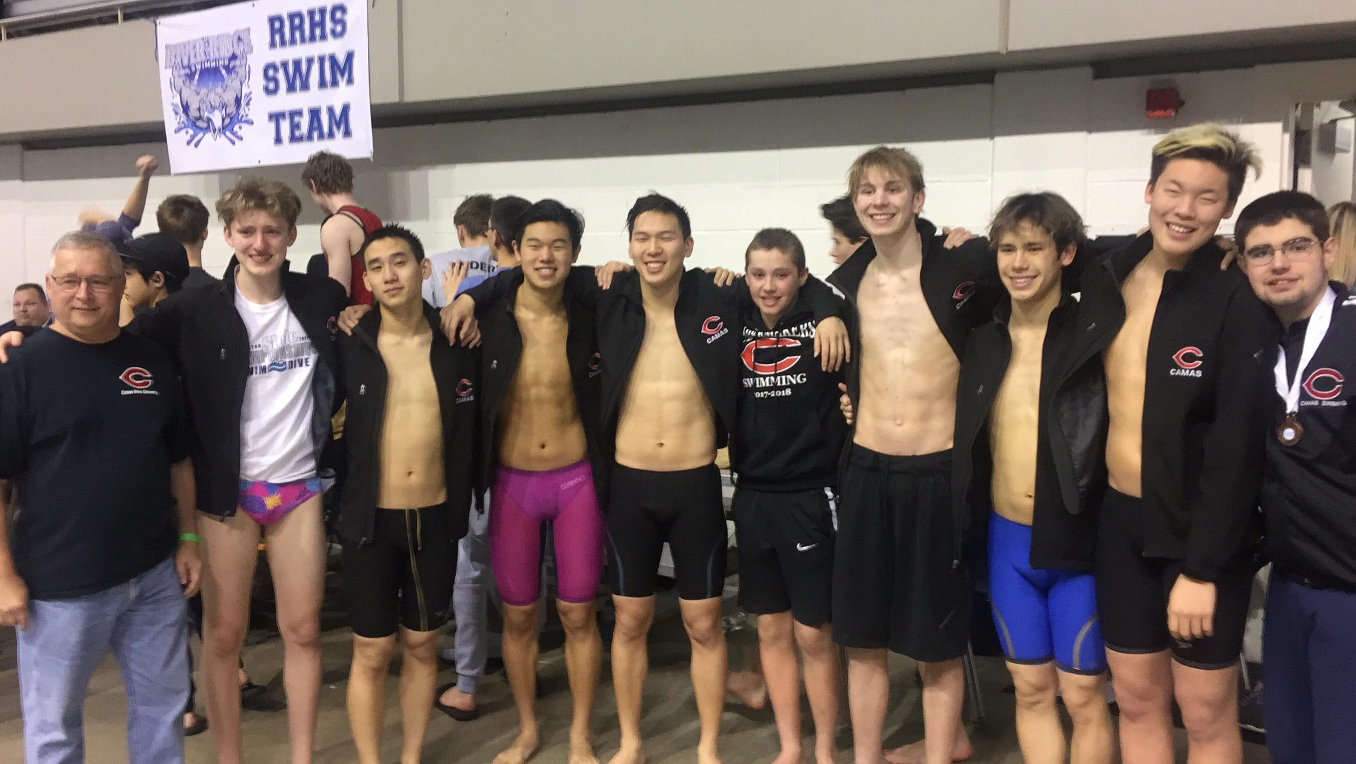 Camas swimmers post on deck after winning back-to-back 4A state boys swimming team titles on Saturday, Feb. 17, 2018 at Federal Way.