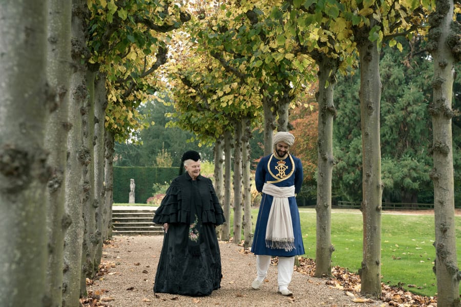 Costumed Judi Dench stars as Queen Victoria and Ali Fazal as Karim in “Victoria and Abdul.” MUST CREDIT: Peter Mountain, Focus Features