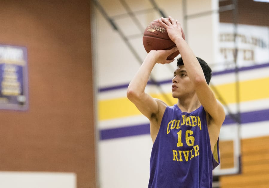 Columbia River High School senior Nasseen Gutierrez practices free throws during practice at the high school gym on Jan. 18.