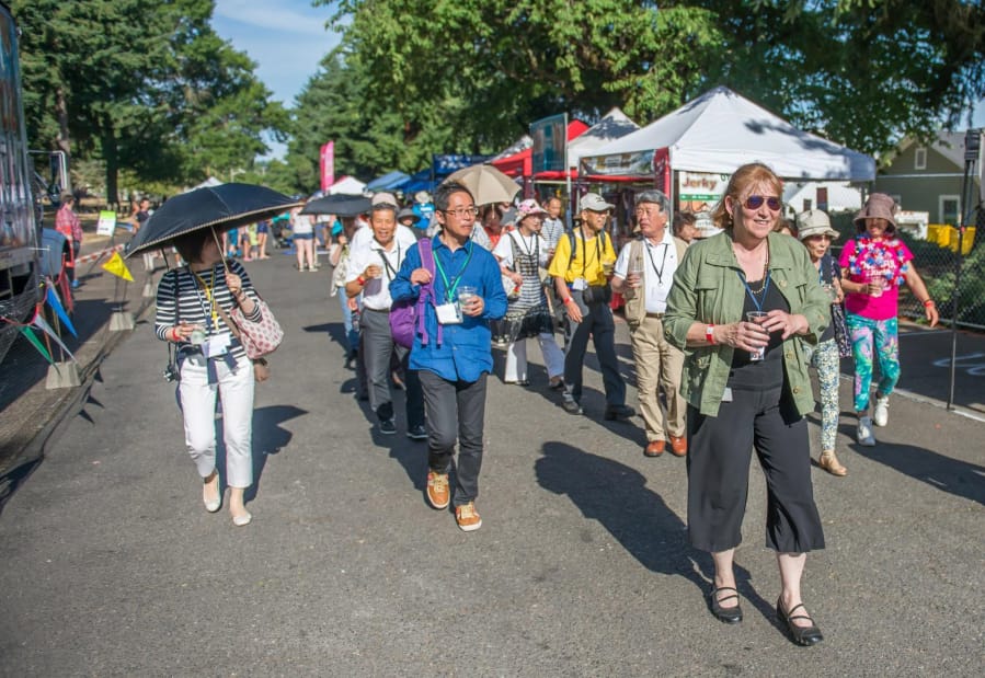 The Joyo, Japan delegation enjoys Fourth of July festivities at the Fort Vancouver National Historic Site in 2015 led by Anne McEnerny-Ogle. McEnerny-Ogle has served as a Sister City liaison since before her election as mayor.
