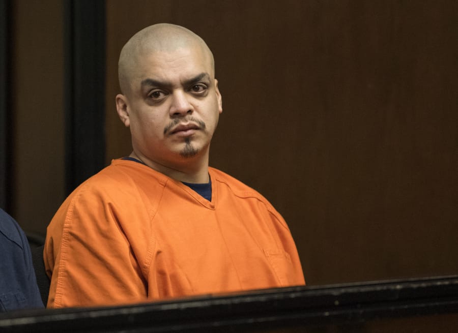 Jesus Prado waits to be sentenced Friday in Clark County Superior Court for his role in an October robbery. He was sentenced to 42 months in prison.