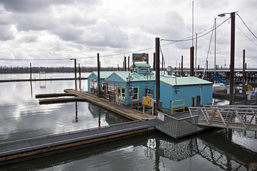 The Puffin Cafe in the Port of Camas-Washougal looks like a house on the water and the restaurant takes advantage of its location with an oceanic theme, including a big ship wheel and other nautical decor.