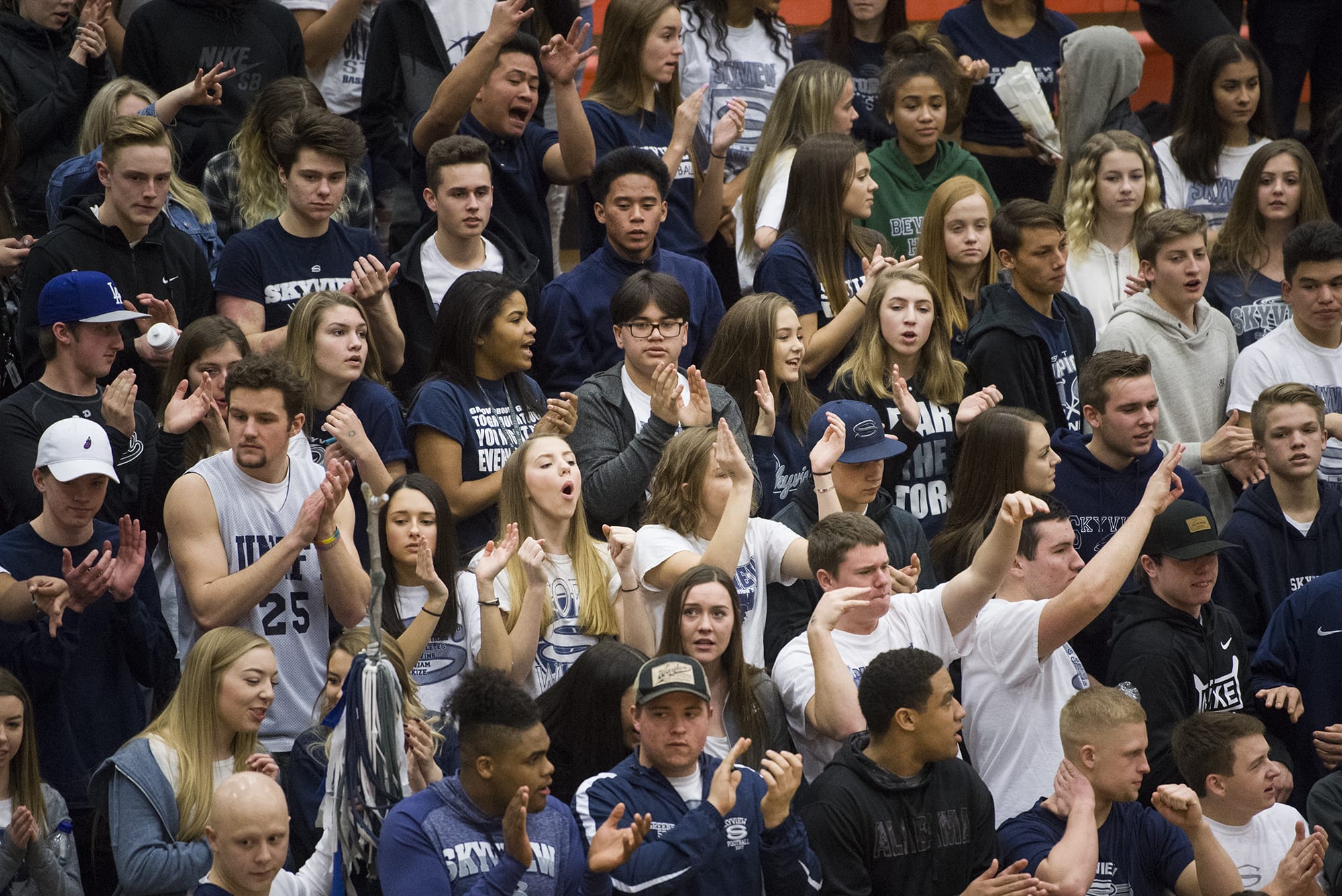 Skyview Storm fans cheer on the boys basketball team during the 4A regional game against Enumclaw at Battle Ground High School, Saturday February 24, 2018.