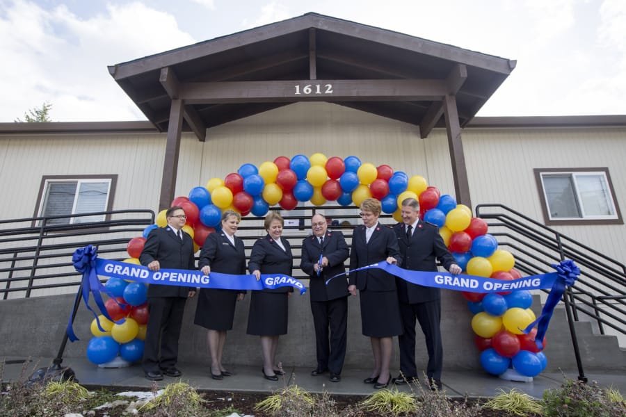 Ministry leaders cut a ribbon at the Salvation Army’s inauguration of a new building in Washougal on Saturday.
