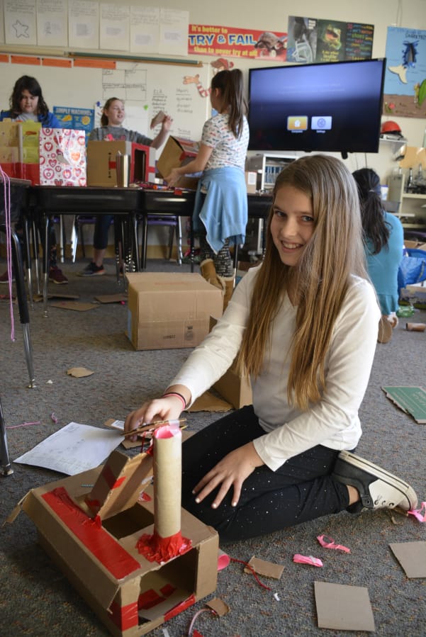 Washougal: Nevaeh McCallister and other Hathaway Elementary School fifth-graders in Andrew Schlauch’s class had to make boxes to collect Valentine’s Day cards using at least two simple machines, such as pulleys, wedges and levers.