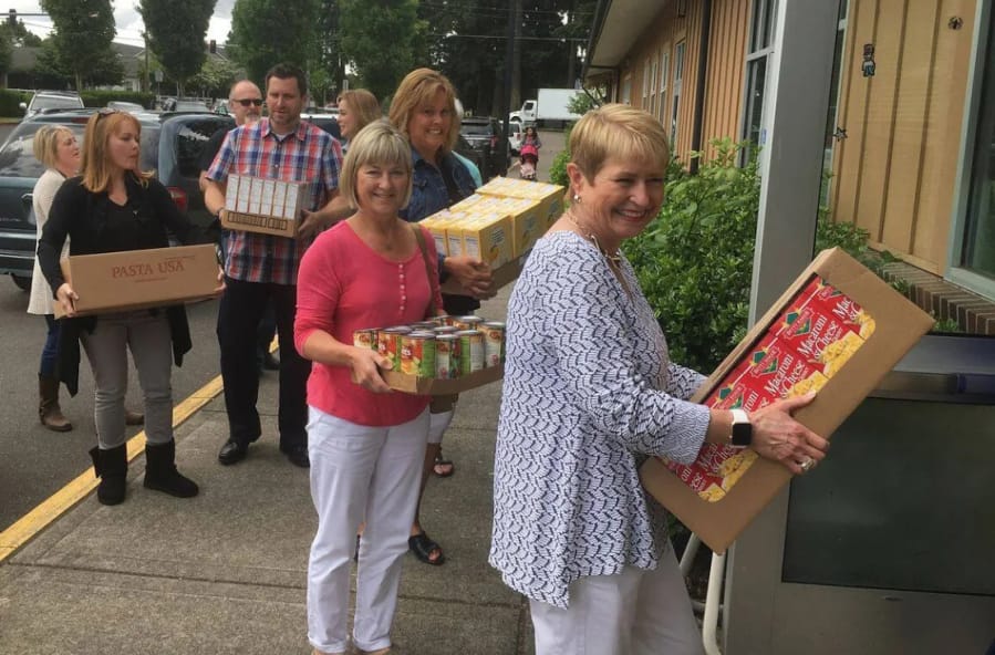 Esther Short: Windermere Realty Trust employees during a service day in Vancouver. The company’s charitable foundation donated more than $405,000 to nonprofits supporting low-income families, including $139,480 that went to organizations in Southwest Washington.