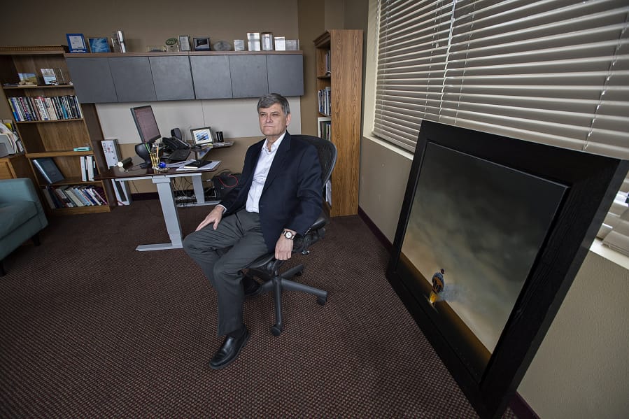 Columbia Ventures Corporation CEO Ken Peterson, seen in his Vancouver office, has invested more than $40 million in Washington in the last year. An investment in augmented reality company RealWear could revitalize the local tech scene.