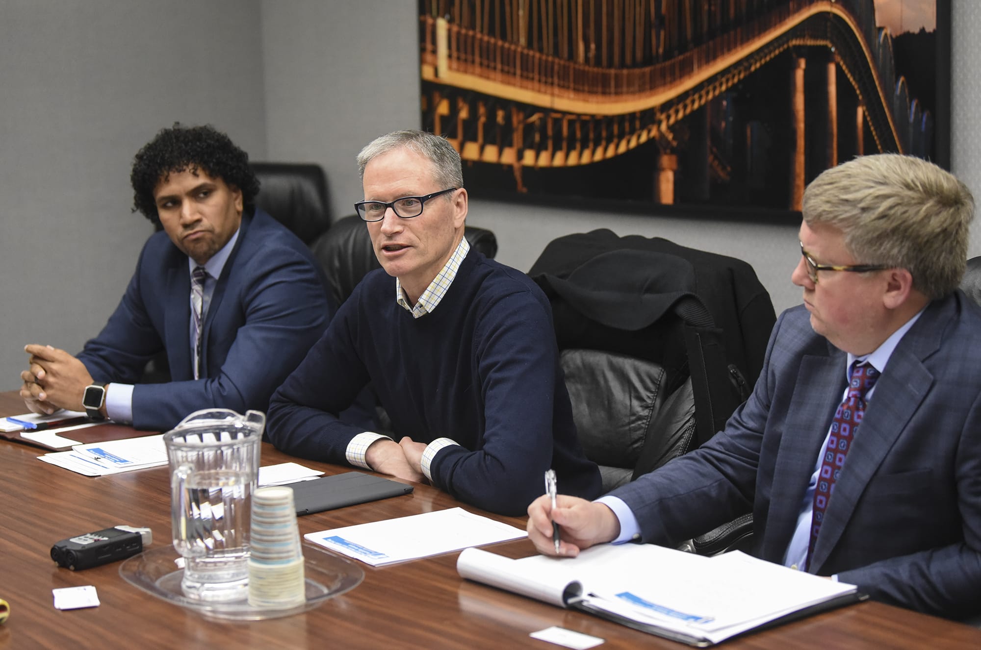 Oregon Department of Transportation Commissioner Alando Simpson, from left, Commissioner Sean O'Hollaren and Region 1 Manager Rian Windsheimer discuss the state's plan for tolling Interstate 5 and Interstate 205 with The Columbian Editorial Board on Wednesday.