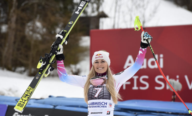 United States' Lindsey Vonn celebrates after winning an alpine ski, women's world Cup downhill race, in Garmisch Partenkirchen, Germany, Sunday, Feb. 4, 2018.