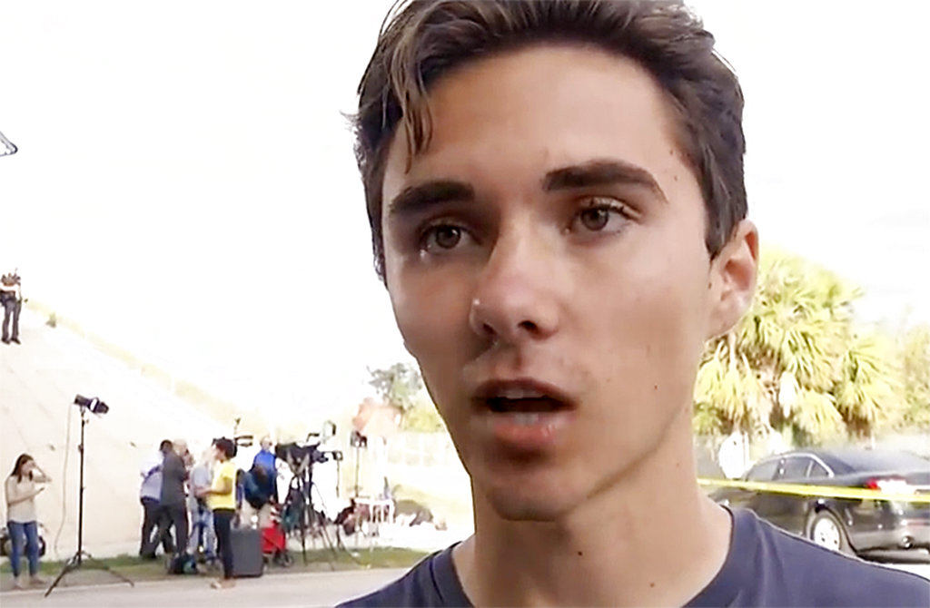 In this Feb. 15, 2018 image made from video, David Hogg talks about his experiences at Marjory Stoneman Douglas High when a gunman opened fire and killed 17 students and faculty in Parkland, Fla.. Hogg, a senior, became an outspoken advocate for gun control in the wake of the shooting, making him a target of online trolls.