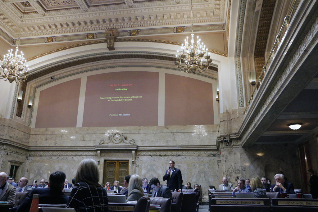 Republican Rep. Matt Shea speaks on the House floor in favor of a measure that would exempt lawmakers from the state's Public Records Act, on Friday, Feb. 23, 2018, in Olympia, Wash. The House passed the measure on a 83-14 vote.