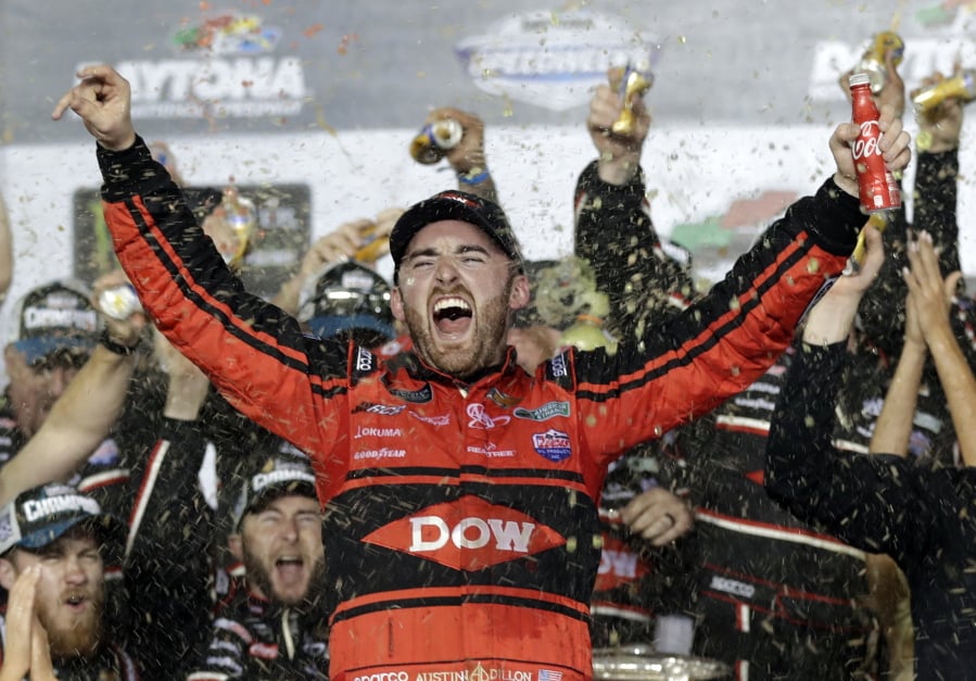 Austin Dillon celebrates in Victory Lane after winning the NASCAR Daytona 500 Cup series auto race at Daytona International Speedway in Daytona Beach, Fla., Sunday, Feb. 18, 2018.