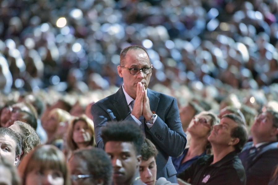 Parent Fred Guttenberg watches a monitor honoring the 17 students and teachers who were killed at Marjory Douglas Stoneman High School, during a CNN “Stand Up” town hall meeting, Wednesday, Feb. 21, 2018, in Sunrise, Fla. Guttenberg’s 14-year-old daughter Jaime Guttenberg was killed on Feb. 14 with 16 others.