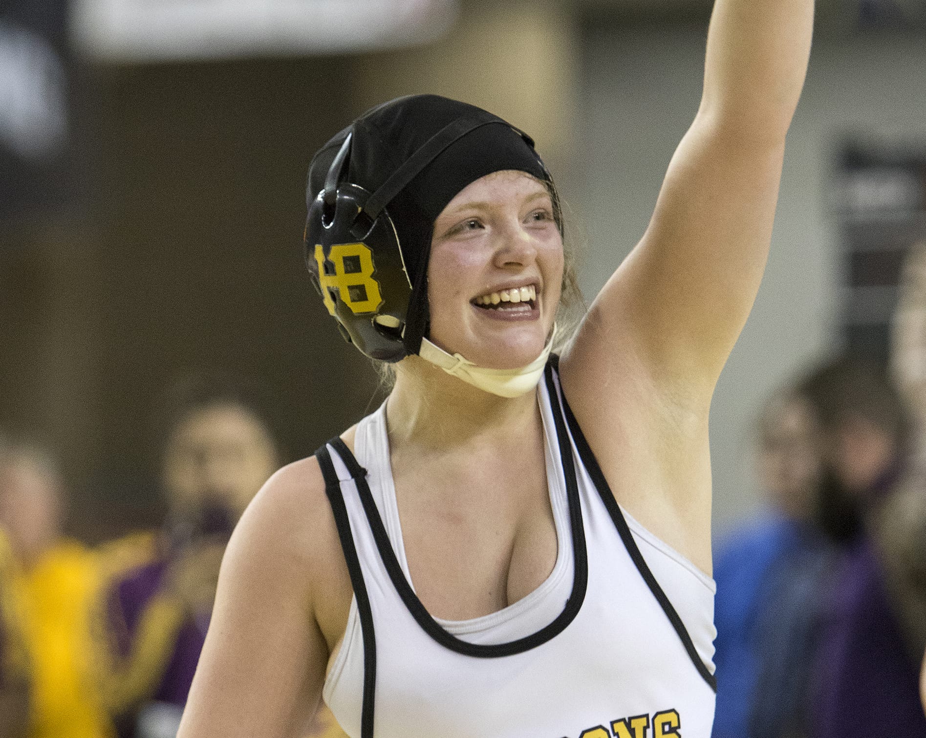 Hudson's Bay's Allison Blaine celebrates after defeating Sequim's Kiara Pierson in their 135-pound championship match at the Girls State Wrestling Tournament Saturday, Feb. 17, 2018, at the Tacoma Dome in Tacoma, Wash. Blaine won the match 4-2.