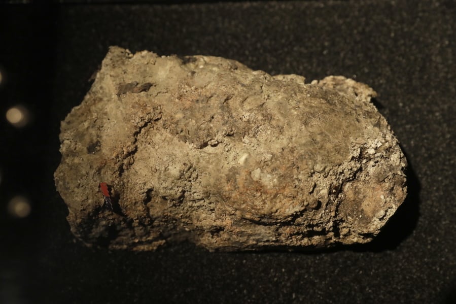 What looks like a plastic snack wrapper, bottom left, forms part of the only remaining piece of the 130 ton, 250 meter long fatberg, removed from the sewers in the Whitechapel area of east London in the latter months of 2017, displayed during a media preview at the Museum of London in London, Thursday, Feb. 8, 2018. The sample is being displayed as part of the ‘Fatberg!’ exhibition, which opens to the public from Feb. 9 to July 1 and details the work involved in clearing a fatberg from a sewer. The Whitechapel fatberg was formed from a mass of oil and grease congealed with wet wipes and other sanitary products.
