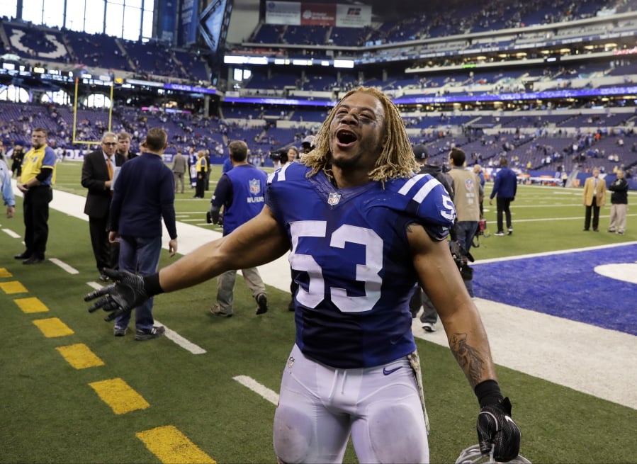 FILE - In this Nov. 20, 2016 file photo, Indianapolis Colts linebacker Edwin Jackson (53) walks off the field following an NFL football game against the Tennessee Titans in Indianapolis. Jackson, 26, was one of two men killed when a suspected drunken driver struck them as they stood outside their car along a highway in Indianapolis. The Colts said in a statement Sunday, Feb. 4, 3018, that the team is “heartbroken” by Jackson’s death. Authorities say the driver that struck them before dawn on Sunday tried to flee on foot but was quickly captured.