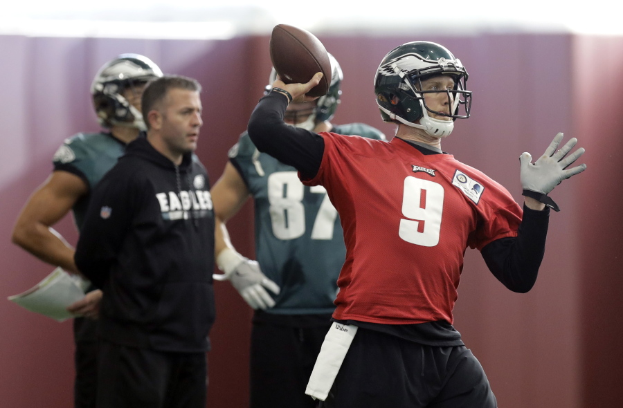 Philadelphia Eagles quarterback Nick Foles (9) throws during a practice for the NFL Super Bowl 52 football game Thursday, Feb. 1, 2018, in Minneapolis. Philadelphia is scheduled to face the New England Patriots Sunday.