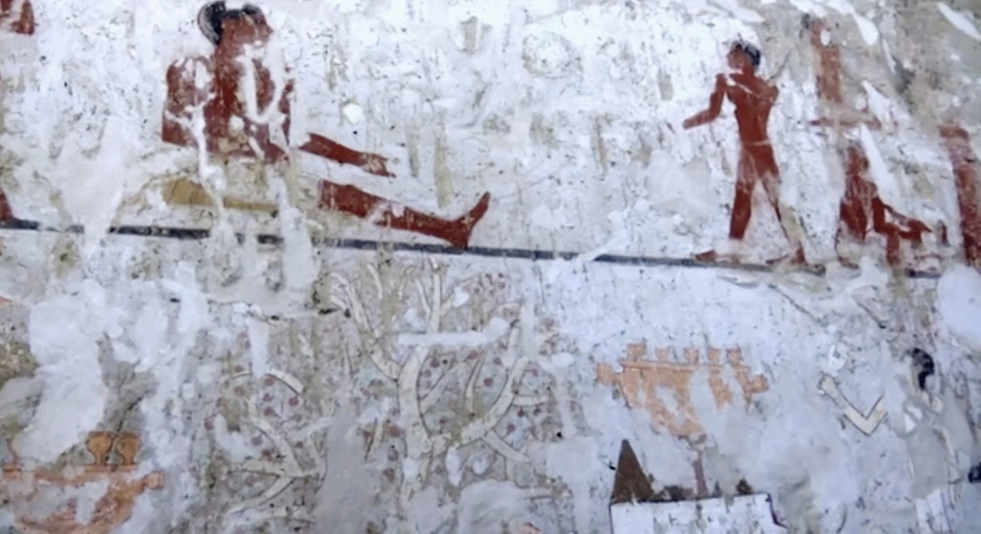 This image taken from video on Saturday, Feb. 3, 2018, shows wall paintings inside a 4,400-year-old tomb near the pyramids outside Cairo, Egypt. Egypt's Antiquities Ministry announced the discovery Saturday and said the tomb likely belonged to a high-ranking official known as Hetpet during the 5th Dynasty of ancient Egypt. The tomb includes wall paintings depicting Hetpet observing different hunting and fishing scenes.