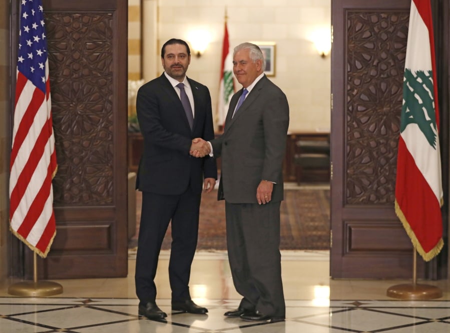 Lebanese Prime Minister Saad Hariri, left, shakes hands with U.S. Secretary of State Rex Tillerson, at the Government House, in Beirut, Lebanon, Thursday, Feb. 15, 2018. Tillerson held talks with the Lebanese president and other officials amid a growing dispute between the small Mediterranean country and neighboring Israel over oil and gas reserves, and Israel’s construction of a border wall that Lebanon says encroaches on its territory.