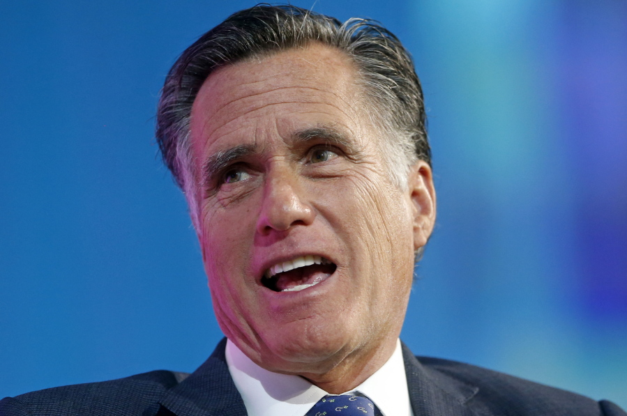 FILE - In this Jan. 19, 2018, file photo, former Republican presidential candidate Mitt Romney speaks about the tech sector during an industry conference dubbed Silicon Slopes, the nickname for Utah’s burgeoning cluster of tech companies, in Salt Lake City. Romney is trying for a political comeback as he launches a Senate campaign in Utah.