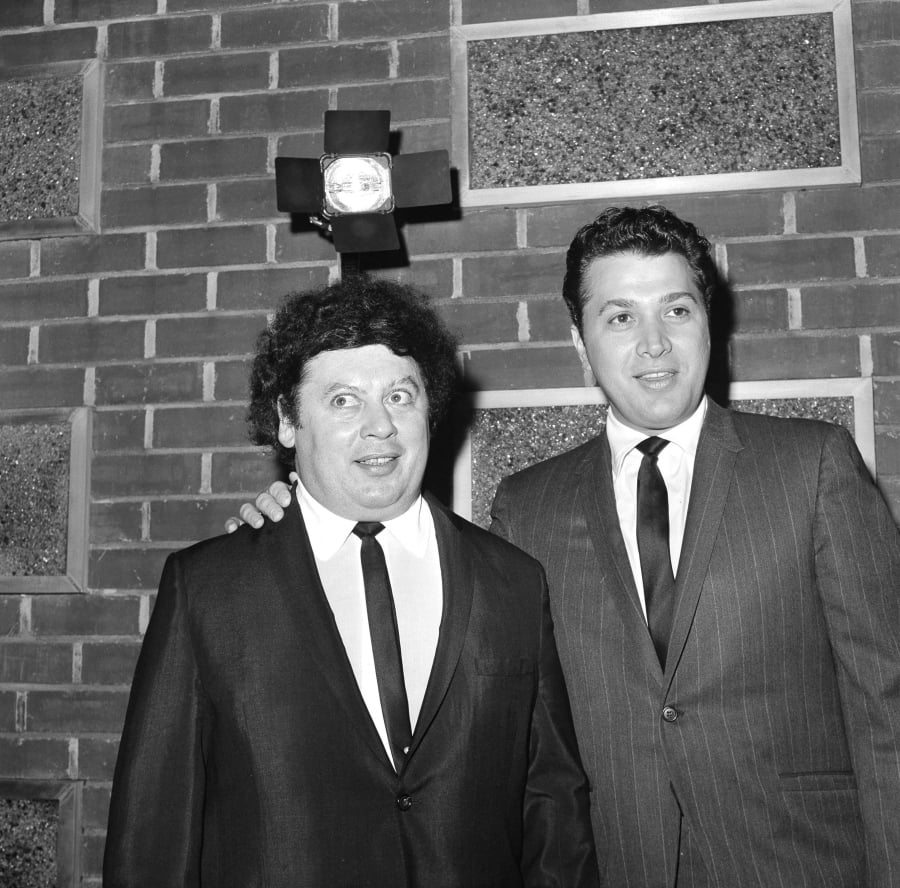 The comedy team of Marty Allen, left, and Steve Rossi, on the Paramount lot in Los Angeles on Dec. 10, 1965. Allen’s spokeswoman Candi Cazau says he died Monday of complications from pneumonia. His wife and performing partner Karon Kate Blackwell was by his side. He was 95. (AP Photo/David F.